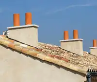 Pose et réparation de chapeau de cheminée 24